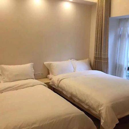 Dingding Inn Жангжиаже Екстериор снимка