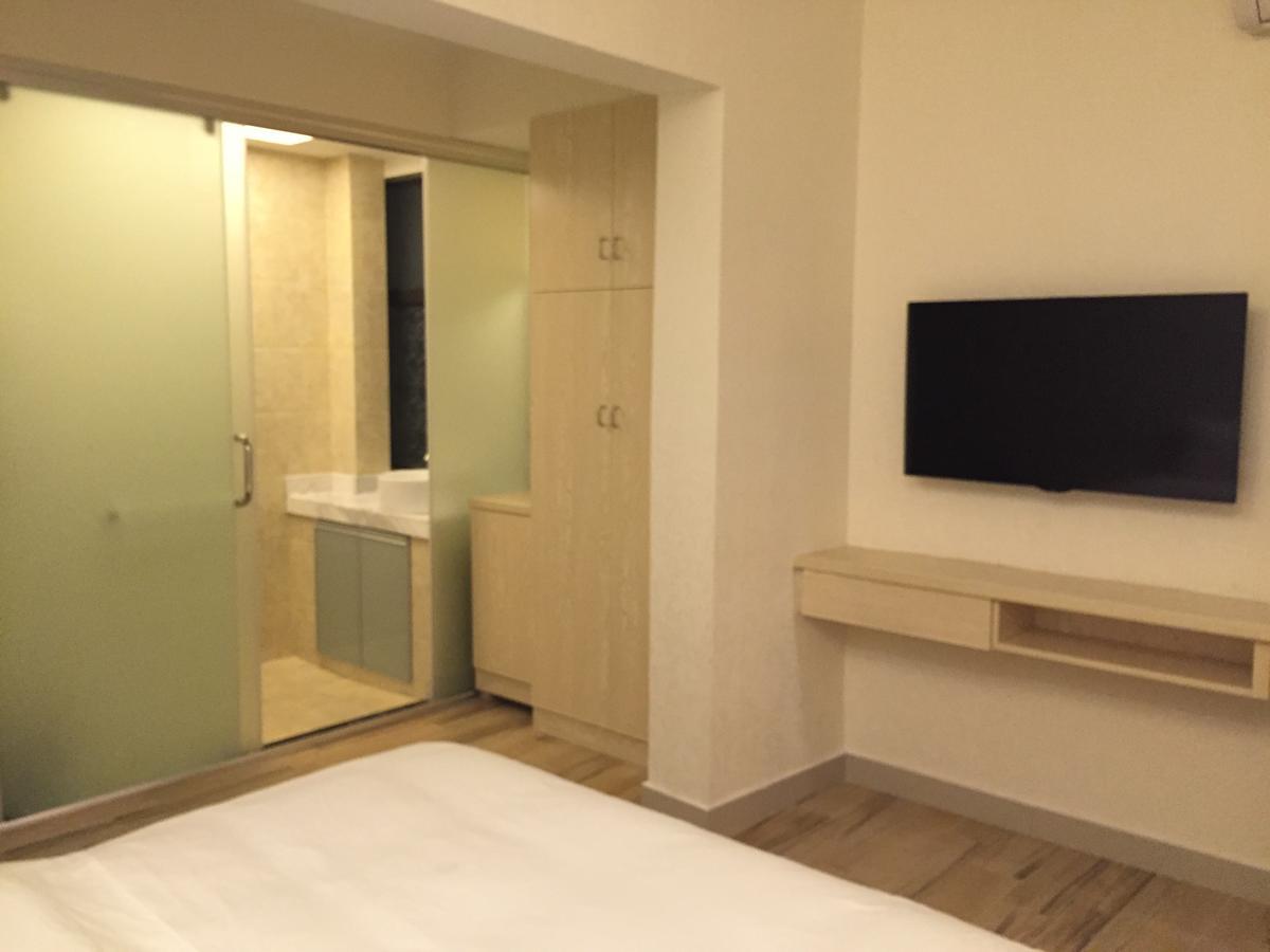 Dingding Inn Жангжиаже Екстериор снимка