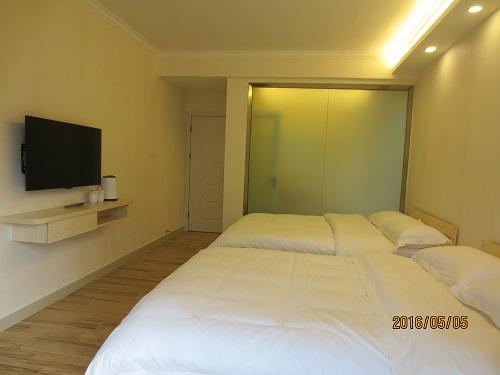 Dingding Inn Жангжиаже Екстериор снимка
