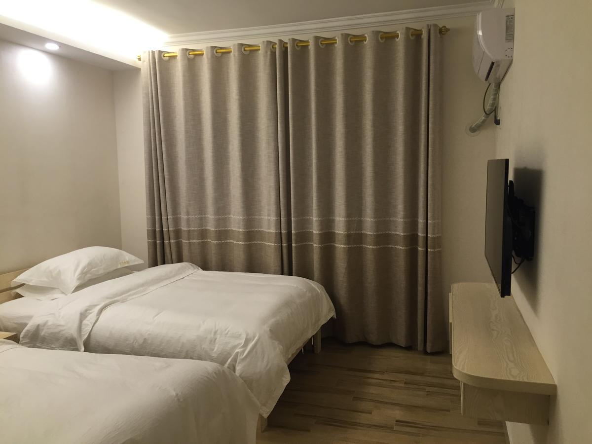Dingding Inn Жангжиаже Екстериор снимка