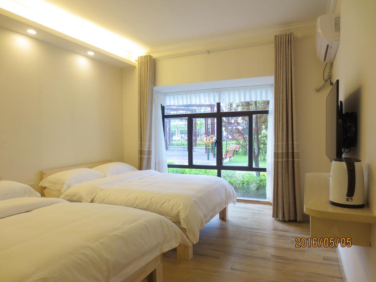 Dingding Inn Жангжиаже Екстериор снимка