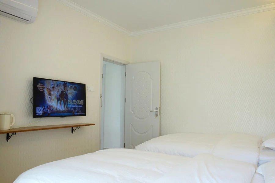 Dingding Inn Жангжиаже Екстериор снимка