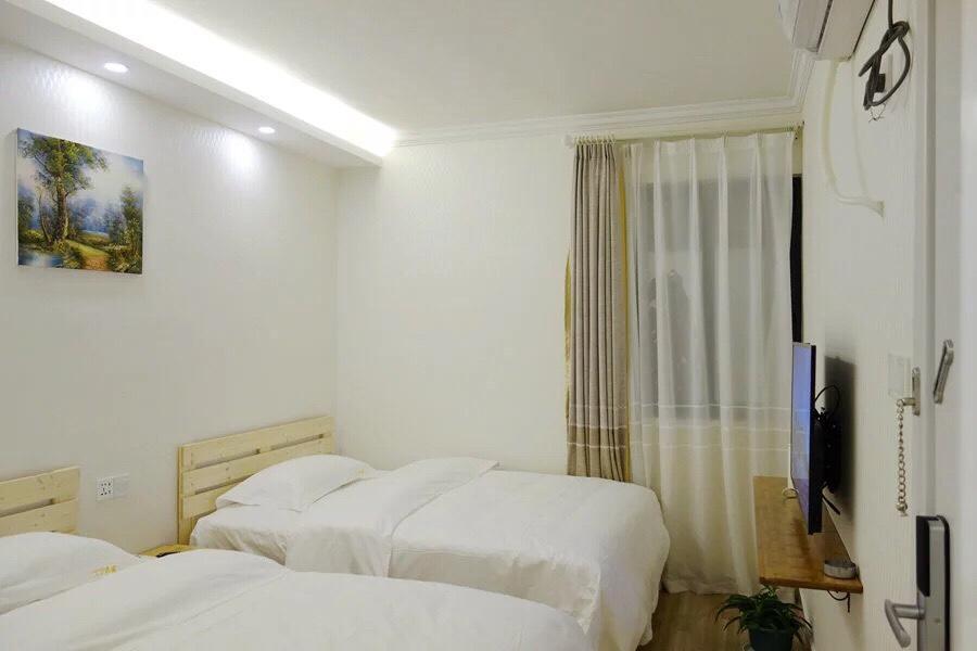 Dingding Inn Жангжиаже Екстериор снимка